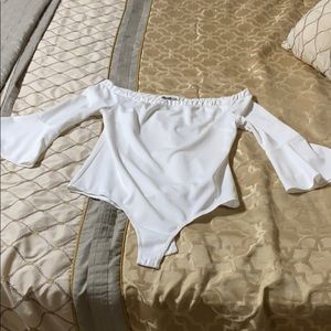 White Medium body suit with bell sleeve.